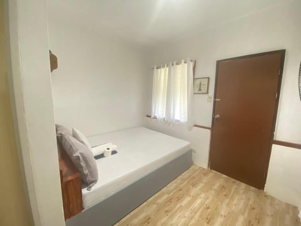 Mil'S Hillside Tourist Inn Сан Висенте Екстериор снимка